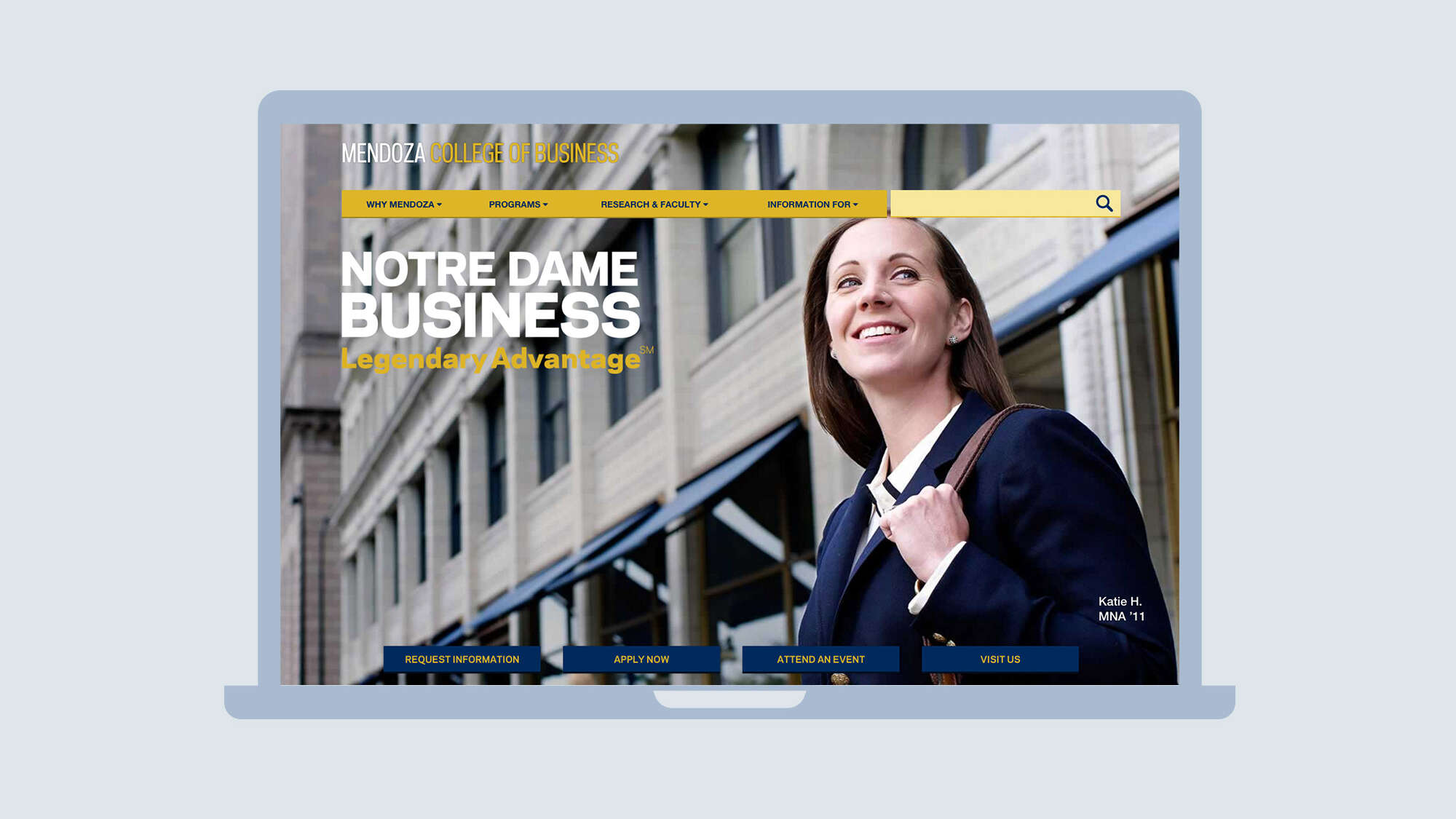 Mendoza College of Business home page on laptop with photo of woman in suit in front of Santa Fe building